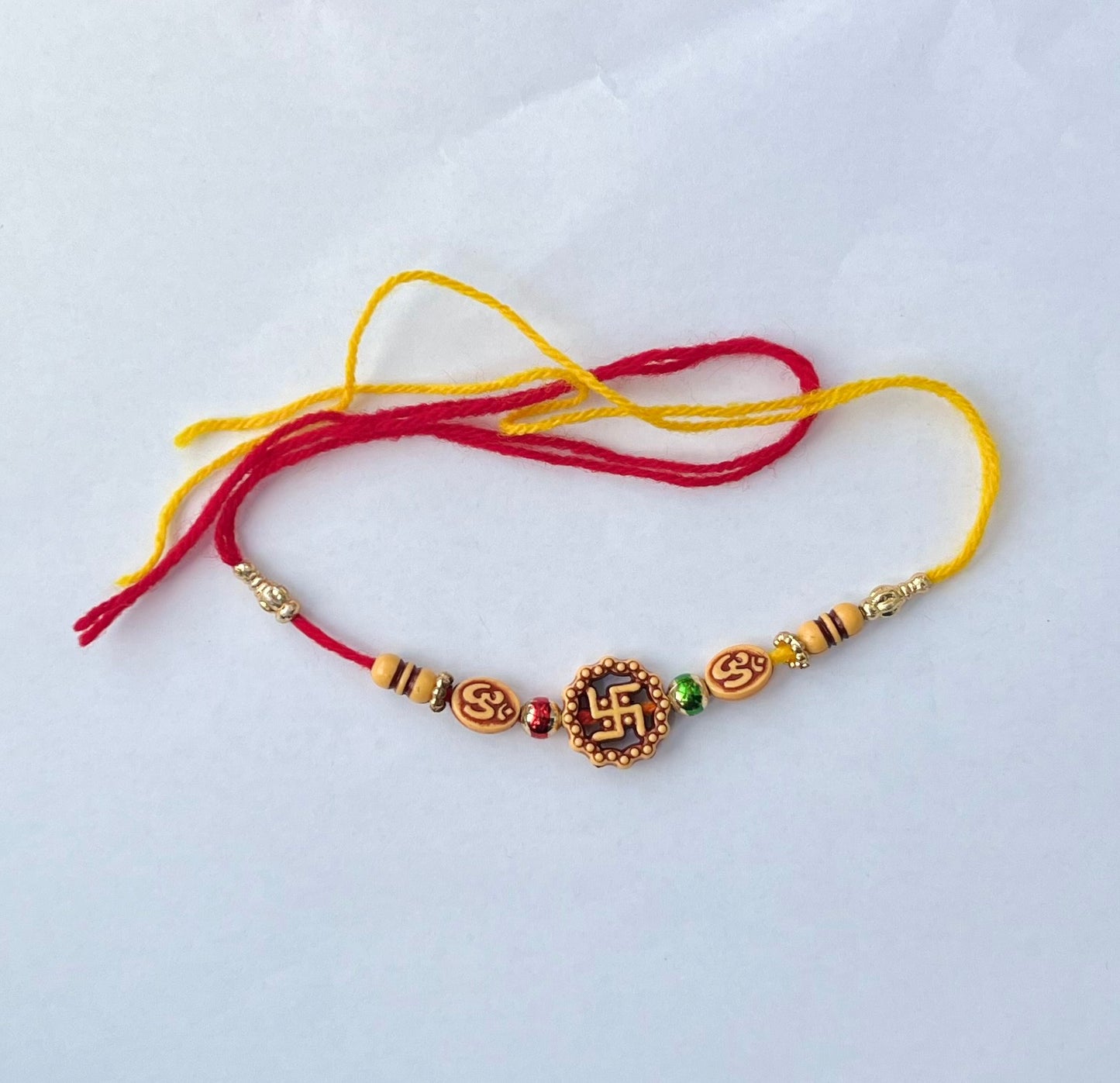 Swastika Om Rakhi (1pc)