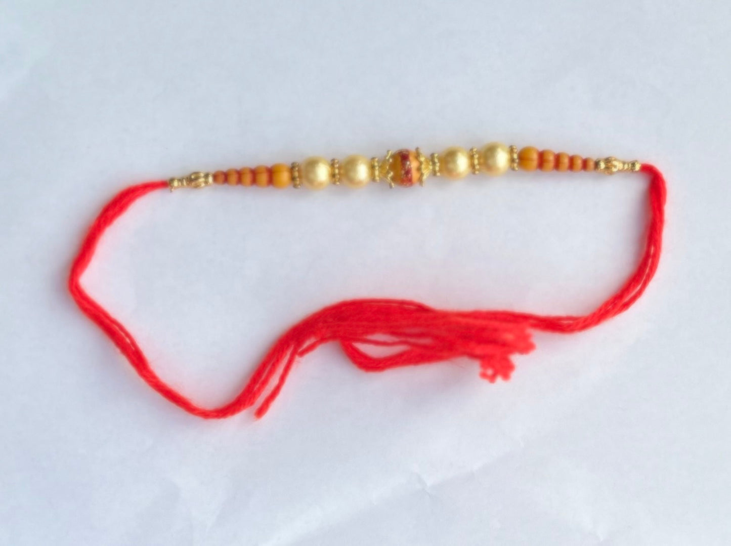 Orange Golden Beads Rakhi (1pc)