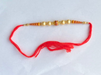 Orange Golden Beads Rakhi (1pc)