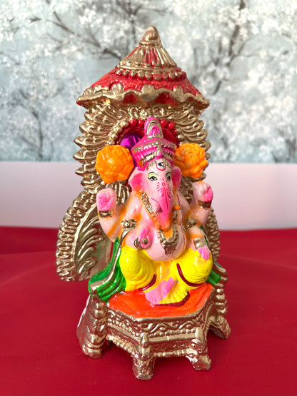 Ganesha In Sinhasan With Chhtra And Orange Flower (20cm)